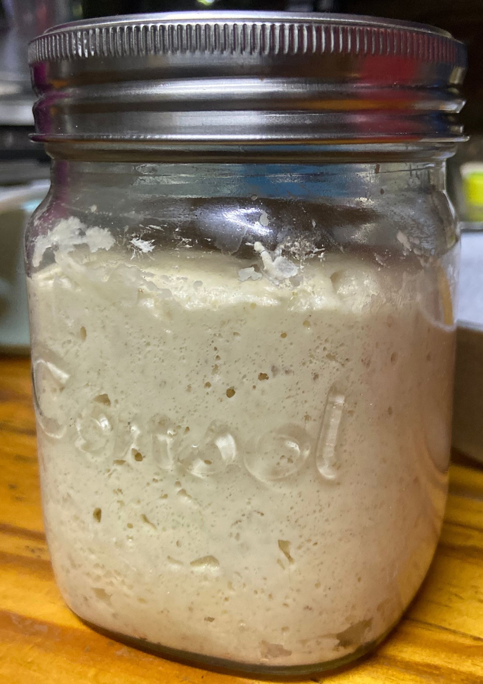 Sourdough starter in glass jar