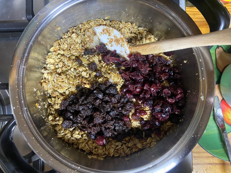 raisins and cranberries on top of granola