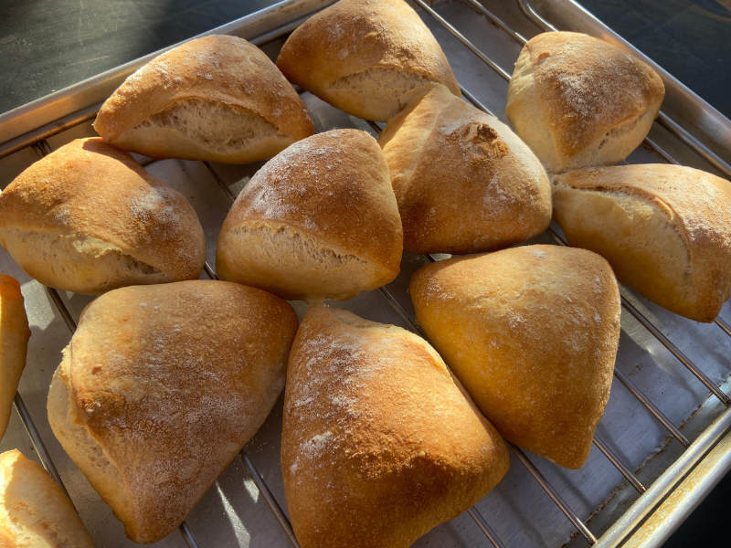 Easy sourdough ciabatta rolls on drying rack