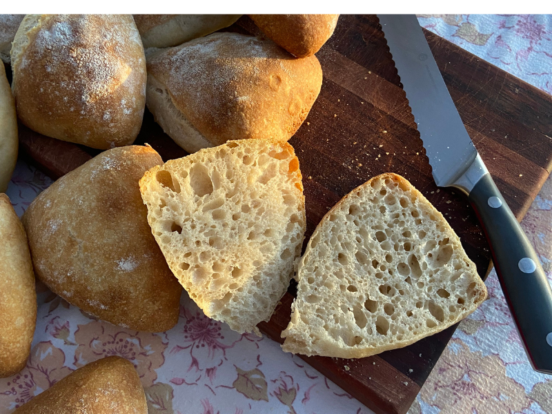 Easy sourdough ciabatta roll cut open to reveal beautiful crumb