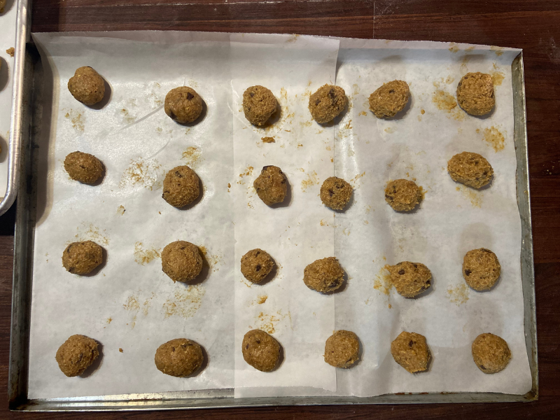rolled cookie dough on a baking sheet