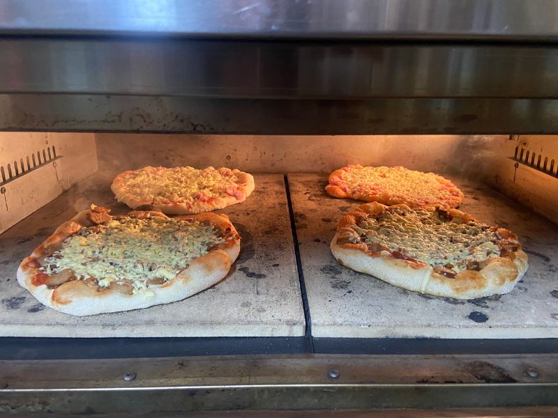 The Best Sourdough Pizza cooking in oven