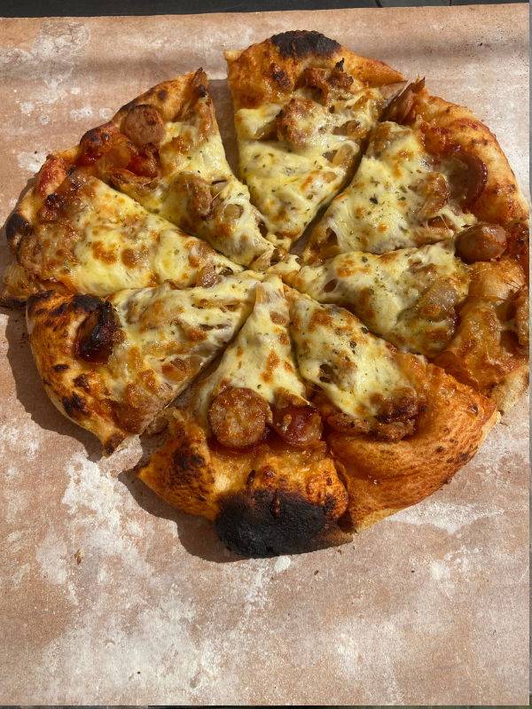 Pizza baked to perfection on the Open Baking Sourdough Bread Method